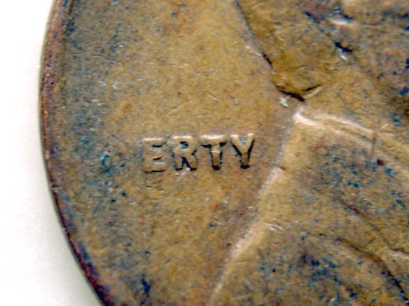 1945-Lincoln-Wheat-Cent,-Struck-Thru-Or-Post-Mint-Damage?
